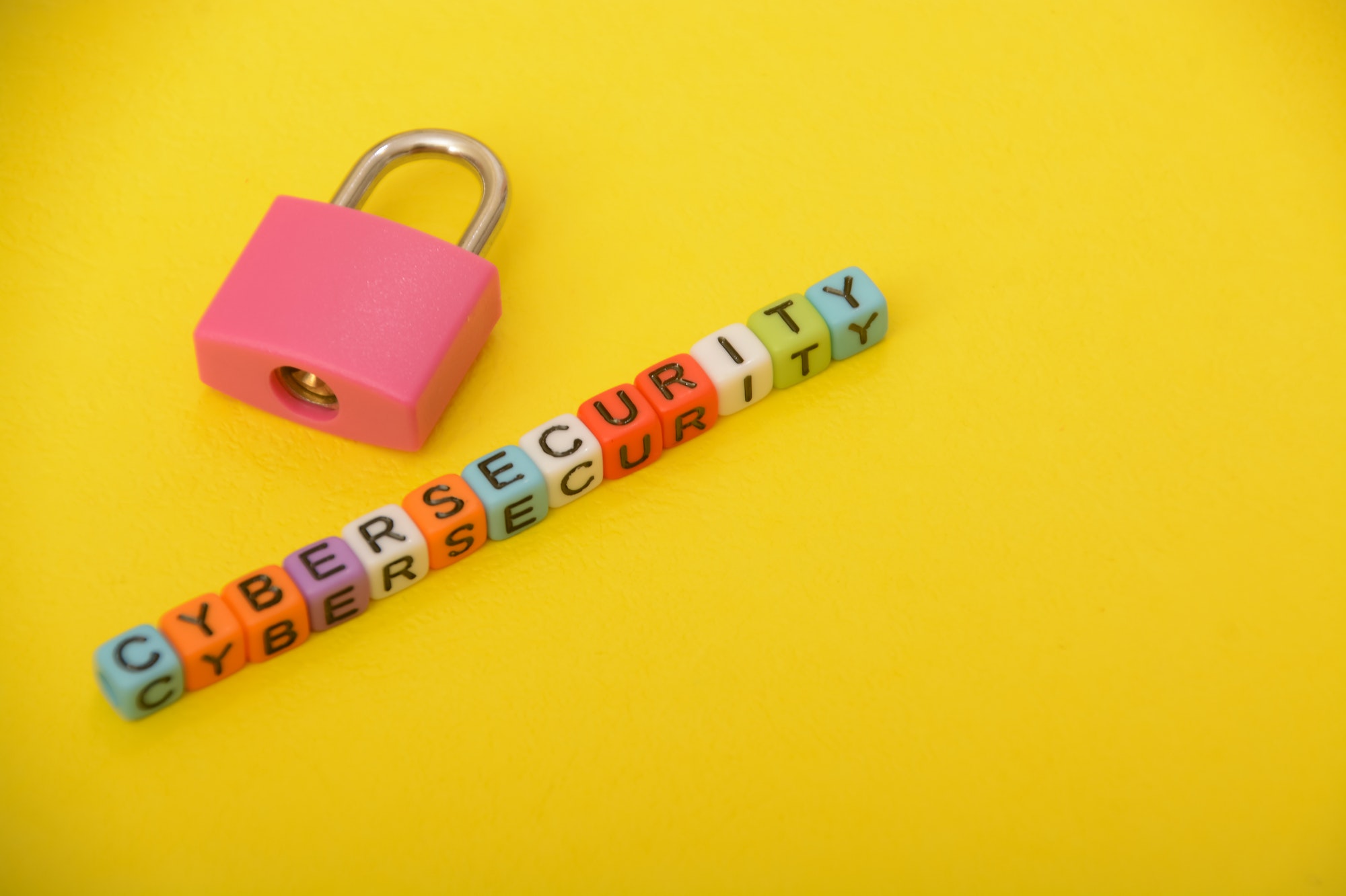 Close-up shots of creatively arranged letters forming words related to the CYBERSECURITY.